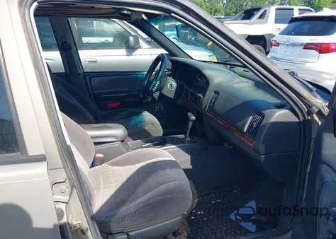 1997 Jeep Grand Cherokee Laredo/Tsi из США, поврежденный, VIN 1J4FX58S1VC514156